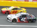 May 27, 2018: Monster Energy NASCAR Cup Series drivers Kyle Larson (42) and Joey Logano (22) race for position off of turn four during the Coca-Cola 600 in Concord, NC.  Jonathan Huff/CSM