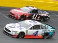 May 27, 2018: Monster Energy NASCAR Cup Series drivers Kevin Harvick (4) and Kurt Busch (41) race for position off of turn four during the Coca-Cola 600 in Concord, NC.  Jonathan Huff/CSM