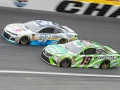 May 27, 2018: Monster Energy NASCAR Cup Series drivers Daniel Suarez (19) and Chris Buescher (37) race for position off of turn four during the Coca-Cola 600 in Concord, NC.  Jonathan Huff/CSM