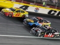 May 27, 2018: Monster Energy NASCAR Cup Series drivers Clint Bowyer (14), Martin Truex Jr. (78), and Joey Logano (22) race three wide off of turn four during the Coca-Cola 600 in Concord, NC.  Jonathan Huff/CSM