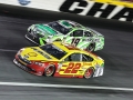 May 27, 2018: Monster Energy NASCAR Cup Series driver Joey Logano (22) and Daniel Suarez (19) race off of turn four during the Coca-Cola 600 in Concord, NC.  Jonathan Huff/CSM