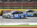 May 27, 2018: Monster Energy NASCAR Cup Series drivers Jimmie Johnson (48) and Chris Buescher (37) race race side by side down the front stretch during the Coca-Cola 600 in Concord, NC.  Jonathan Huff/CSM