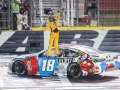 May 27, 2018: Monster Energy NASCAR Cup Series driver Kyle Busch (18) celebrates winning the Coca-Cola 600 in Concord, NC.  Jonathan Huff/CSM