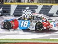 May 27, 2018: Monster Energy NASCAR Cup Series driver Kyle Busch (18) celebrates winning the Coca-Cola 600 in Concord, NC.  Jonathan Huff/CSM