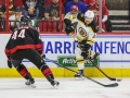 May 14, 2019: Boston Bruins left wing Marcus Johansson (90) takes a shot on goal during game 3 of the NHL Eastern Conference Championship series between the Boston Bruins and the Carolina Hurricanes held at PNC Arena in Raleigh, NC. Boston defeats Carolina 2-1. Jonathan Huff/CSM