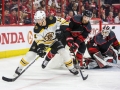May 14, 2019: Boston Bruins right wing Chris Wagner (14) looks for a shot on goal during game 3 of the NHL Eastern Conference Championship series between the Boston Bruins and the Carolina Hurricanes held at PNC Arena in Raleigh, NC. Boston defeats Carolina 2-1. Jonathan Huff/CSM