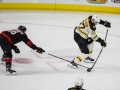 May 16, 2019: Boston Bruins center Patrice Bergeron (37) takes a shot on goal during game 4 of the NHL Eastern Conference Championship series between the Boston Bruins and the Carolina Hurricanes held at PNC Arena in Raleigh, NC. Boston defeats Carolina 4-0. Jonathan Huff/CSM
