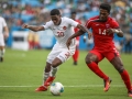 June 23, 2019: Canada forward Jonathan David (20) and Cuba midfielder Jean Carlos Rodriguez (14) battle for the ball during the CONCACAF Gold Cup soccer match between Canada and Cuba held at Bank of America Stadium in Charlotte, NC. Jonathan Huff/CSM