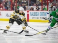 December 23, 2018: Boston Bruins left wing Brad Marchand (63) skates between Hurricanes defenders during the NHL game between the Boston Bruins and the Carolina Hurricanes at PNC Arena in Raleigh, NC. Jonathan Huff/CSM