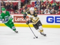 December 23, 2018: Boston Bruins center Ryan Donato (17) works to clear the puck from his zone during the NHL game between the Boston Bruins and the Carolina Hurricanes at PNC Arena in Raleigh, NC. Jonathan Huff/CSM