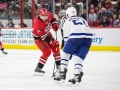 December 11, 2018: Carolina Hurricanes right wing Justin Williams (14) has his shot deflected by Toronto Maple Leafs defenseman Jake Gardiner (51) during the NHL game between the Toronto Maple Leafs and the Carolina Hurricanes at PNC Arena in Raleigh, NC. Jonathan Huff/CSM
