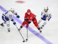 December 11, 2018: Carolina Hurricanes left wing Brock McGinn (23) tries to split the Maple Leafs defense during the NHL game between the Toronto Maple Leafs and the Carolina Hurricanes at PNC Arena in Raleigh, NC. Jonathan Huff/CSM