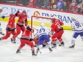 December 11, 2018: Carolina Hurricanes defenseman Justin Faulk (27) and left wing Warren Foegele (13) try and knock the puck out of the air in front of their goal during the NHL game between the Toronto Maple Leafs and the Carolina Hurricanes at PNC Arena in Raleigh, NC. Jonathan Huff/CSM