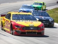 March 24, 2019: Monster Energy NASCAR Cup Series drivers Joey Logano (22) and Kevin Harvick (4) race off turn two during the STP 500 in Ridgeway, VA. Jonathan Huff/CSM