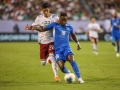 June 23, 2019: Martinique defender Samuel Camille (18) and Mexico defender Jorge Sanchez (22) battle for the ball during the CONCACAF Gold Cup soccer match between Martinique  and Mexico held at Bank of America Stadium in Charlotte, NC. Jonathan Huff/CSM