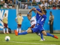 June 23, 2019: Mexico defender Fernando Navarro (19) gets past Martinique defenders to score the third goal of the CONCACAF Gold Cup soccer match between Martinique  and Mexico held at Bank of America Stadium in Charlotte, NC. Jonathan Huff/CSM