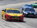 March 24, 2019: Monster Energy NASCAR Cup Series drivers Joey Logano (22) and Kevin Harvick (4) race off turn two during the STP 500 in Ridgeway, VA. Jonathan Huff/CSM