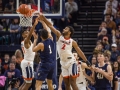 December  29, 2019: Navy Midshipmen guard John Carter Jr. (1) has his shot blocked by Virginia Cavaliers guard Braxton Key (2) during NCAA basketball action between the Navy Midshipmen and the Virginia Cavaliers at John Paul Jones Arena Charlottesville, VA. Jonathan Huff/CSM