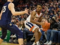December  29, 2019: Virginia Cavaliers guard Casey Morsell (13) looks for an open pass into the paint during NCAA basketball action between the Navy Midshipmen and the Virginia Cavaliers at John Paul Jones Arena Charlottesville, VA. Jonathan Huff/CSM