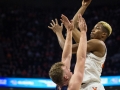December  29, 2019: Virginia Cavaliers forward Mamadi Diakite (25) shoots over Navy Midshipmen center Evan Wieck (40) during NCAA basketball action between the Navy Midshipmen and the Virginia Cavaliers at John Paul Jones Arena Charlottesville, VA. Jonathan Huff/CSM