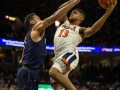 December  29, 2019: Virginia Cavaliers guard Casey Morsell (13) goes up for a contested shot during NCAA basketball action between the Navy Midshipmen and the Virginia Cavaliers at John Paul Jones Arena Charlottesville, VA. Jonathan Huff/CSM