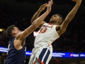 December  29, 2019: Virginia Cavaliers guard Casey Morsell (13) goes up for a contested shot during NCAA basketball action between the Navy Midshipmen and the Virginia Cavaliers at John Paul Jones Arena Charlottesville, VA. Jonathan Huff/CSM
