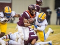 November 23, 2019: Virginia Tech Hokies running back Deshawn McClease (33) tries to break free of Pitt defenders during NCAA football action between the Pitt Panthers and the Virginia Tech Hokies at Lane Stadium in Blacksburg, VA. Jonathan Huff/CSM