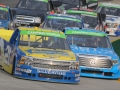 Racing off turn four