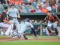 July 12, 2019: Tampa Bay Rays third baseman Yandy Diaz (2) dives into home safe during MLB action between the Tampa Bay Rays and the Baltimore Orioles at Camden Yards in Baltimore, MD. Jonathan Huff/CSM