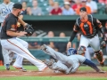 July 12, 2019: Tampa Bay Rays third baseman Yandy Diaz (2) dives into home safe during MLB action between the Tampa Bay Rays and the Baltimore Orioles at Camden Yards in Baltimore, MD. Jonathan Huff/CSM