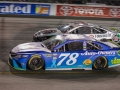 September 22, 2018: Monster Energy NASCAR Cup Series driver Martin Truex Jr. (78) passes Kevin Harvick (4) for the lead during stage on of the Federated Auto Parts 400 in Richmond, VA. Jonathan Huff/CSM