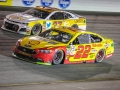 September 22, 2018: Monster Energy NASCAR Cup Series drivers Joey Logano (22) and Chris Buescher (37) battle for position in turn one during the Federated Auto Parts 400 in Richmond, VA. Jonathan Huff/CSM