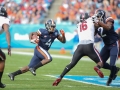December 29, 2018: Virginia Cavaliers wide receiver Olamide Zaccheaus (4) looks for an opening in the South Carolina defense during NCAA football action between the South Carolina Gamecocks and the Virginia Cavilers at Bank of America Stadium in Charlotte, NC. Jonathan Huff/CSM