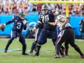 December 29, 2018: Virginia Cavaliers quarterback Bryce Perkins (3) tries to break past the South Carolina defense.  during NCAA football action between the South Carolina Gamecocks and the Virginia Cavilers at Bank of America Stadium in Charlotte, NC. Jonathan Huff/CSM