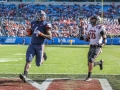 December 29, 2018: Virginia Cavaliers wide receiver Olamide Zaccheaus (4) runs into the end zone to score one of this three receiving touchdowns of the day during NCAA football action between the South Carolina Gamecocks and the Virginia Cavilers at Bank of America Stadium in Charlotte, NC. Jonathan Huff/CSM