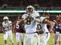 October 25, 2018: Georgia Tech Yellow Jackets quarterback Tobias Oliver (8) celebrates a touchdown in the first half during NCAA football action between the Georgia Tech Yellow Jackets and the Virginia Tech Hokies at Lane Stadium in Blacksburg, VA. Jonathan Huff/CSM