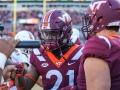 November 17, 2018: Virginia Tech Hokies defensive back Reggie Floyd (21) fist bumps a Miami player before NCAA football action between the Miami Hurricanes and the Virginia Tech Hokies at Lane Stadium in Blacksburg, VA. Jonathan Huff/CSM