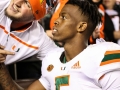 November 17, 2018: Miami Hurricanes quarterback N'Kosi Perry (5) takes a selfie with a fan after Miami's victory after NCAA football action between the Miami Hurricanes and the Virginia Tech Hokies at Lane Stadium in Blacksburg, VA. Jonathan Huff/CSM