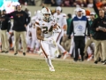 November 17, 2018: Miami Hurricanes running back Travis Homer (24) gets past Hokie defenders during NCAA football action between the Miami Hurricanes and the Virginia Tech Hokies at Lane Stadium in Blacksburg, VA. Jonathan Huff/CSM