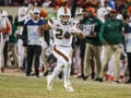 November 17, 2018: Miami Hurricanes running back Travis Homer (24) gets past Hokie defenders during NCAA football action between the Miami Hurricanes and the Virginia Tech Hokies at Lane Stadium in Blacksburg, VA. Jonathan Huff/CSM