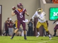 October 6, 2018: Virginia Tech Hokies quarterback Ryan Willis (5) tries to get a pass off under pressure during NCAA football action between the Notre Dame Fighting Irish and the Virginia Tech Hokies at Lane Stadium in Blacksburg, VA. Jonathan Huff/CSM