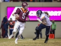November 23, 2018: Virginia Tech Hokies quarterback Ryan Willis (5) tries escapes out of the backfield during NCAA football action between the Virginia Cavaliers and the Virginia Tech Hokies at Lane Stadium in Blacksburg, VA. Jonathan Huff/CSM