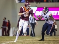 November 23, 2018: Virginia Tech Hokies quarterback Ryan Willis (5) tries escapes out of the backfield during NCAA football action between the Virginia Cavaliers and the Virginia Tech Hokies at Lane Stadium in Blacksburg, VA. Jonathan Huff/CSM