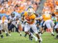 September 1, 2018:Tennessee Volunteers running back Tim Jordan (9) tries to escape West Virginia defenders during NCAA football action between the West Virginia Mountaineers and the Tennessee Volunteers at the Belk College Kickoff at Bank of America Stadium in Charlotte, NC. West Virginia defeated Tennessee 40-14. Jonathan Huff/CSM