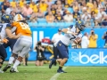 September 1, 2018: West Virginia Mountaineers quarterback Will Grier (7) tries to escape the pocket before being sacked during NCAA football action between the West Virginia Mountaineers and the Tennessee Volunteers at the Belk College Kickoff at Bank of America Stadium in Charlotte, NC. West Virginia defeated Tennessee 40-14. Jonathan Huff/CSM