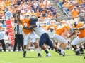 September 1, 2018: Tennessee Volunteers quarterback Jarrett Guarantano (2) sacked by West Virginia Mountaineers defensive lineman Kenny Bigelow Jr. (40) during NCAA football action between the West Virginia Mountaineers and the Tennessee Volunteers at the Belk College Kickoff at Bank of America Stadium in Charlotte, NC. Jonathan Huff/CSM