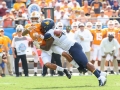 September 1, 2018: Tennessee Volunteers quarterback Jarrett Guarantano (2) sacked by West Virginia Mountaineers defensive lineman Kenny Bigelow Jr. (40) during NCAA football action between the West Virginia Mountaineers and the Tennessee Volunteers at the Belk College Kickoff at Bank of America Stadium in Charlotte, NC. Jonathan Huff/CSM