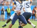 September 1, 2018: West Virginia Mountaineers quarterback Will Grier (7) looks for a receiver downfield during NCAA football game between the West Virginia Mountaineers and the Tennessee Volunteers at the Belk College Kickoff at Bank of America Stadium in Charlotte, NC. Jonathan Huff/CSM