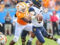 September 1, 2018: West Virginia Mountaineers quarterback Will Grier (7) avoids a sack during NCAA football game between the West Virginia Mountaineers and the Tennessee Volunteers at the Belk College Kickoff at Bank of America Stadium in Charlotte, NC. Jonathan Huff/CSM