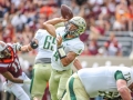 September 8, 2018: William & Mary Tribe quarterback Shon Mitchell (4) throws from the pocket while under pressure during NCAA football action between the William & Mary Tribe and the Virginia Tech Hokies at Lane Stadium in Blacksburg, VA. Jonathan Huff/CSM